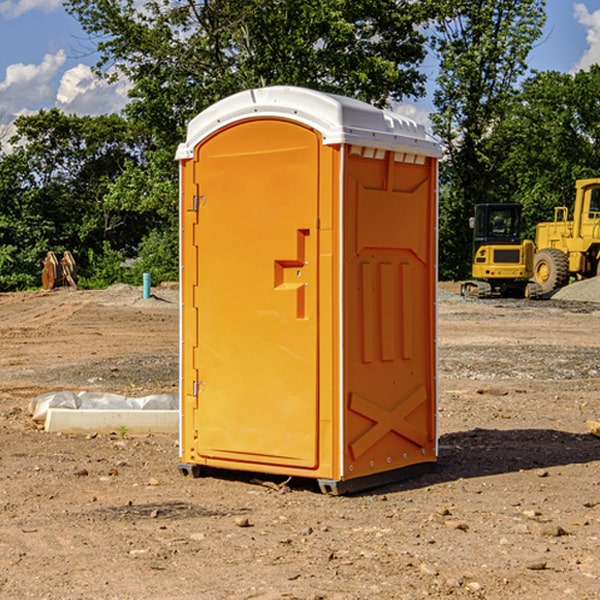 how often are the portable restrooms cleaned and serviced during a rental period in Scott County KS